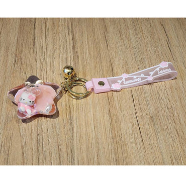Llavero Hello Kitty Sanrio Rosa con Estrella de Arena y Borla