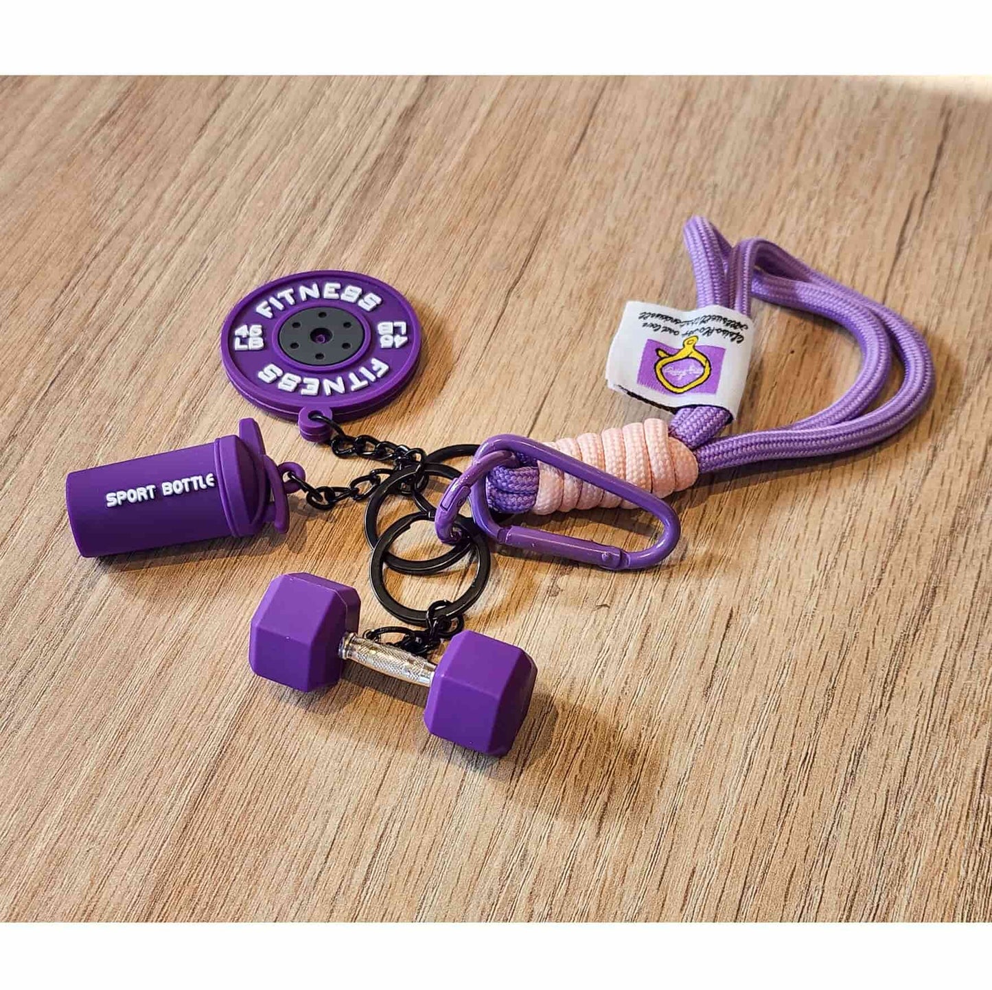 Llavero Deportivo Temático - Mini Mancuerna, Mini Barra de Pesas y Mini Botella Deportiva - Accesorio creativo para Mujer - Fitness - Morado