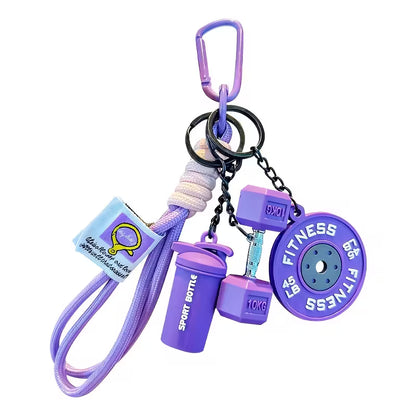 Llavero Deportivo Temático - Mini Mancuerna, Mini Barra de Pesas y Mini Botella Deportiva - Accesorio creativo para Mujer - Fitness - Morado