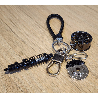 Llavero Temático de Autos de Carrera de Metal con Diseño Mecánico Negro